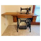 Antique Singer Sewing Machine in table