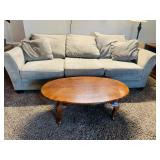 Tan Sofa / Oval Coffee Table