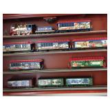 Lone Star Express  - A Single Christmas car and three Kinkade freight cars.