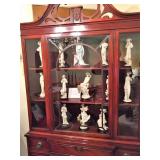Guiseppi Armani Florence Figurine collection in Duncan Phyfe china cabinet