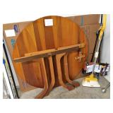 Hand made heavy wooden table with legs and braces.