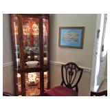 Lighted curio cabinet.