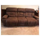 Brown sofa Reclines 2 sides