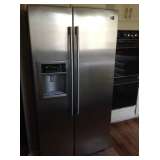 LG side by side refrigerator / freezer. Works perfectly.  Ice & water indoor. 