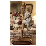 Porcelain Doll On Carousel Horse