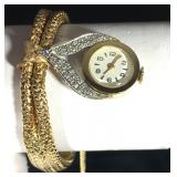 14k Art Deco Bracelet with Gold Watch Capped by White Gold Bannered Pave Diamonds, 6.5", 36.8g; $950 14k Art Deco Bracelet with Gold Watch Capped by White Gold Bannered Pave Diamonds, 6.5", 36.8g; $950