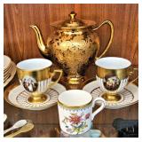 Gilded Porcelain Teapot & Pair of Gilded Teacups & Saucers $20