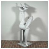 SEATED FEMALE FIGURE