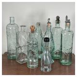 (8pc) MOLDED GLASS BOTTLES