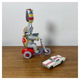 (2pc) VINTAGE | Corgi Toys Ford Mustang & tin elephant spin toy TOYS