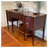 ANTIQUE REGENCY SIDEBOARD | flanked by serpentine-front drawers; h. 37 x 66 x 25 in. 