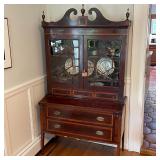 ANTIQUE SECRETARY BOOKCASE | Having glazed cabinet doors with geometric patterns (glass separated by