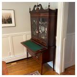 ANTIQUE SECRETARY BOOKCASE | Having glazed cabinet doors with geometric patterns (glass separated by