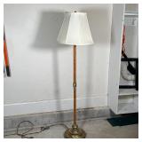 MICROSUN FLOOR LAMP | With faux reptile skin wrapping and brass colored accents; h. 62 in. turns on 