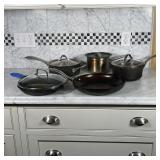 (5pc) POTS AND PANS | Including Lodge 10-1/2 in. cast iron skillet, 12 in. Earthpan, two Caphalon li