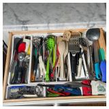 ASSORTED KITCHEN UTENSILS | Including wooden spoons and spatulas, pasta stirrers, slatted metal spoo