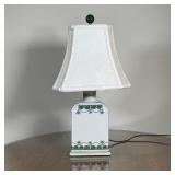 CERAMIC LAMP | Painted with green patterns and gilt accent lines; 19 in.; tested and turns on 