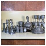 ESTATE LOT OF PEWTER DINNERWARE | The essentials for a colonial banquet; Including a full set of din