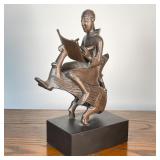 MEDIEVAL SCRIBE SCULPTURE | depicting a scribe writing while sitting backwards on mystical winged bi