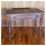 OAK SIDE TABLE | Four turned wood legs on casters, single drawer with two pulls, h. 28-1/2 x 35-1/4 