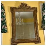 ORNATE GILT WALL MIRROR | Beveled glass; 48 x 32 in. 
