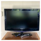 SAMSUNG 32 IN TV & ROKU | 32 inch flatscreen TV, model LN S3251D; includes Roku attachements and rem