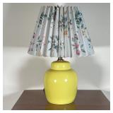 CERAMIC YELLOW LAMP | Small yellow table lamp with a floral paper shade; tested and works; h. 19 in.
