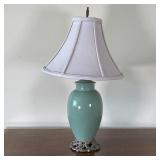 JADE PORCELAIN TABLE LAMP | With iron openwork base and fabric shade; h. 21 in. to top; untested 