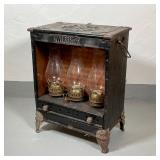 WHEELING CORCO LAMP STOVE | 3 burner oil lamp stove/heater by Wheeling Corrugating Co., Wheeling, W.