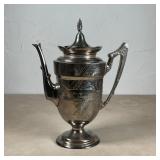1874 SILVER PLATED COFFEE POT | Having a hinged lid, with engraved decoration and inscribed with ded