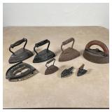 (8pc) ANTIQUE IRONS & STANDS | Including 6 irons and 2 stands, including Enterprise Mfg. Co. Philade