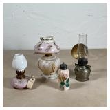 (4pc) FLUID LAMPS & OTHER | Including two painted milk-glass lamps, a painted salt shaker, and a lam
