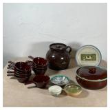 STONEWARE GROUP | Including a crock (h. 8 in.), a lidded casserole dish (dia. 9-1/2 in.), 10+ handle