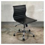 EAMES STYLE OFFICE CHAIR | Chrome frame with a black leather seat, adjustable height; h. 35 x w. 21 