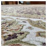 HANDWOVEN PATTERNED CARPET | Purple/brown field with green and beige overall floral pattern, within 