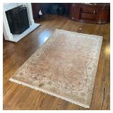 PEACH COLOR RUG | Having an overall pattern on a peach field within a pale peach border; 9 ft. 6 in.
