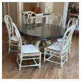 BILTMORE ESTATE TABLE & CHAIRS | A round dining table on a scrollwork and acanthus carved base with 