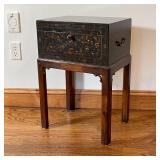 BLACK LACQUERED BOX on STAND | Lacquer decorated box with hinged lid, having a key and side handles,