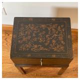 BLACK LACQUERED BOX on STAND | Lacquer decorated box with hinged lid, having a key and side handles,