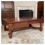 WOOD TRESTLE COFFEE TABLE | On turned legs, having two drawers on each long edge [with some surface 