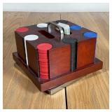POKER CHIP SET & HOLDER | A set of 200 poker chips in a revolving wood stand on a square metal base 