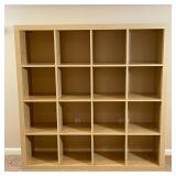 CUBE BOOKSHELF | 4 x 4 cubby bookshelf by Ikea, in a natural wood finish; h. 59 x w. 59 x d. 15-1/2 