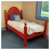 RED PAINTED SINGLE BED | Eddy West twin bed with a domed top headboard and four posts with ball fini
