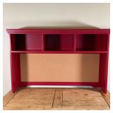 RED PAINTED HUTCH | With three cubbies over a corkboard / bulletin board back; h. 31 x w. 48 x d. 9-