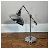 CHROME ADJUSTABLE LAMP | Adjustable counter weight table lamp, articulating arm with a weighted base
