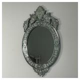 VENETIAN STYLE WALL MIRROR | Oval mirror with patterned glass frame [top with break]; 38 x 21 in. 