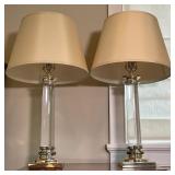 PAIR GLASS COLUMN LAMPS | Table lamps with polished anodized metal terminals and base [with wear] wi