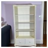 RAGAZZI OPEN BOOKSHELF | With distressed white paint and outset column supports, having four open sh