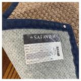 PAIR SAFAVIEH CARPETS | Woven rush carpets, each with navy blue canvas borders, including a 6 ft. x 