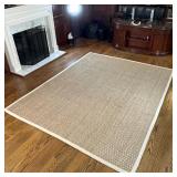 SAFAVIEH WOVEN RUSH CARPET | With a beige canvas border, label to under side; 10 ft. x 7 ft. 10 in. 